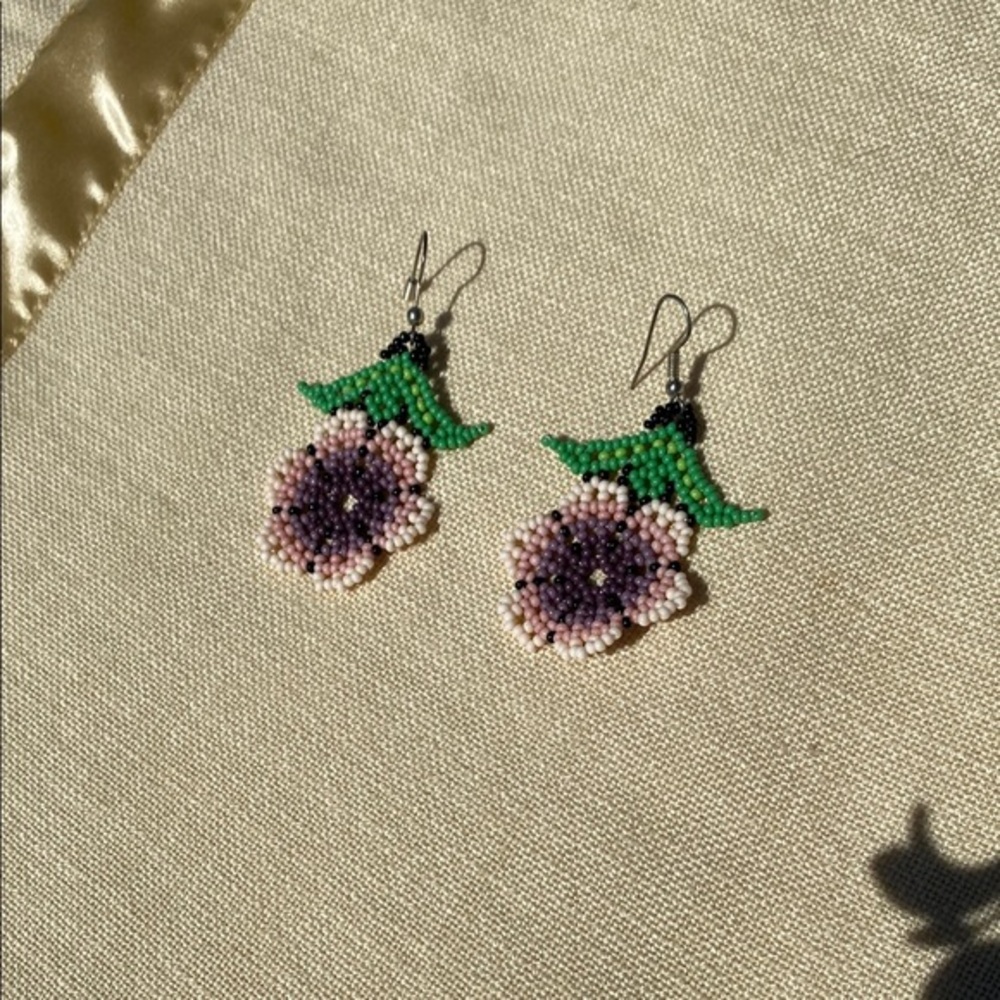 NEW.  Great little handcrafted beaded earrings. Perfect for the Season. BOHO.